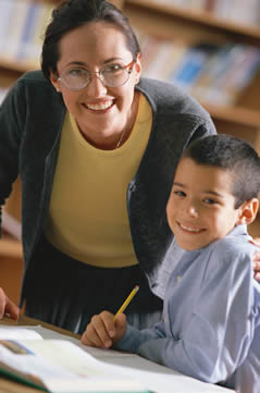 Picture of a Woman with a Child in a Classroom Setting